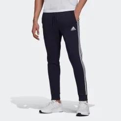 ADIDAS Pantalón Essentials Fleece Tapered Cuff 3 Bandas 10 ADIDAS Pantalón Essentials Fleece Tapered Cuff 3 Bandas -tienda de equipos de fitness pantalon essentials fleece tapered cuff 3 bandas 2