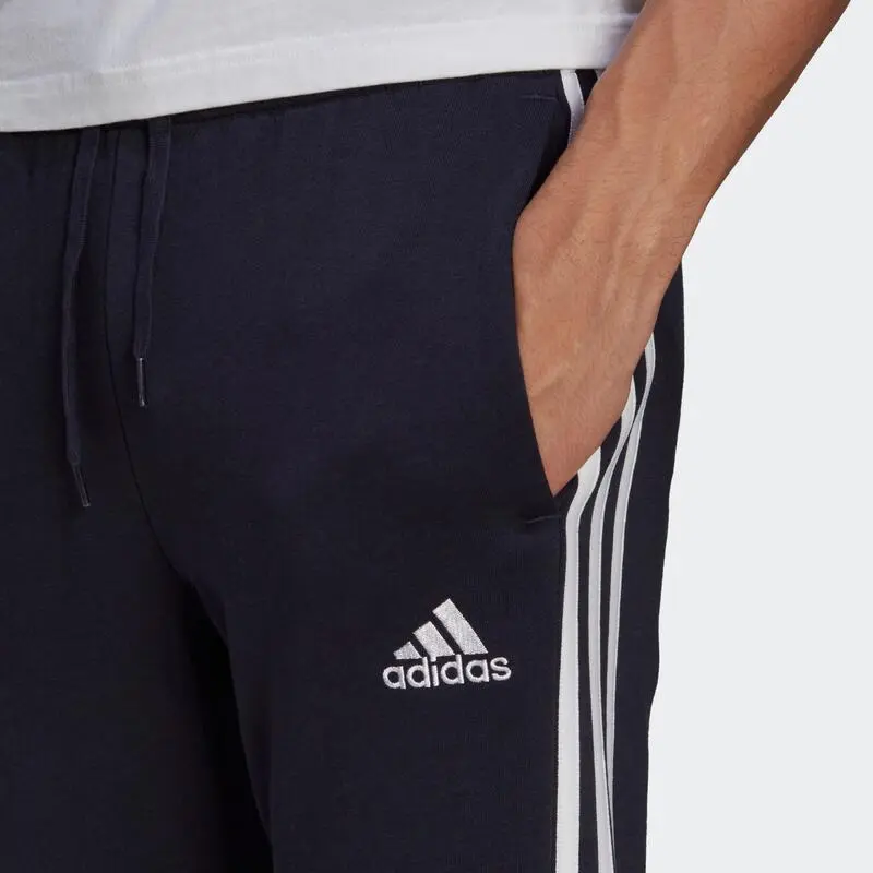 ADIDAS Pantalón Essentials Fleece Tapered Cuff 3 Bandas 7 ADIDAS Pantalón Essentials Fleece Tapered Cuff 3 Bandas - Imagen 5